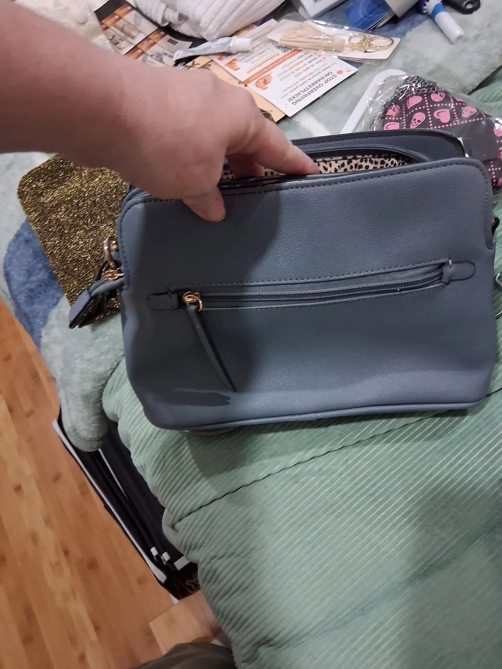 Small Pebbled Light Gray Crossbody Bag with Gold Accent